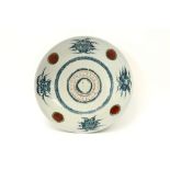 17th Cent. Chinese Ming period dish in porcelain with a polychrome decor a central circle surrounded