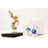 a crystal Pegasus sculpture and a "Swarowski Crystal Planet Vision 2000" (with its box) ||Lot (2)