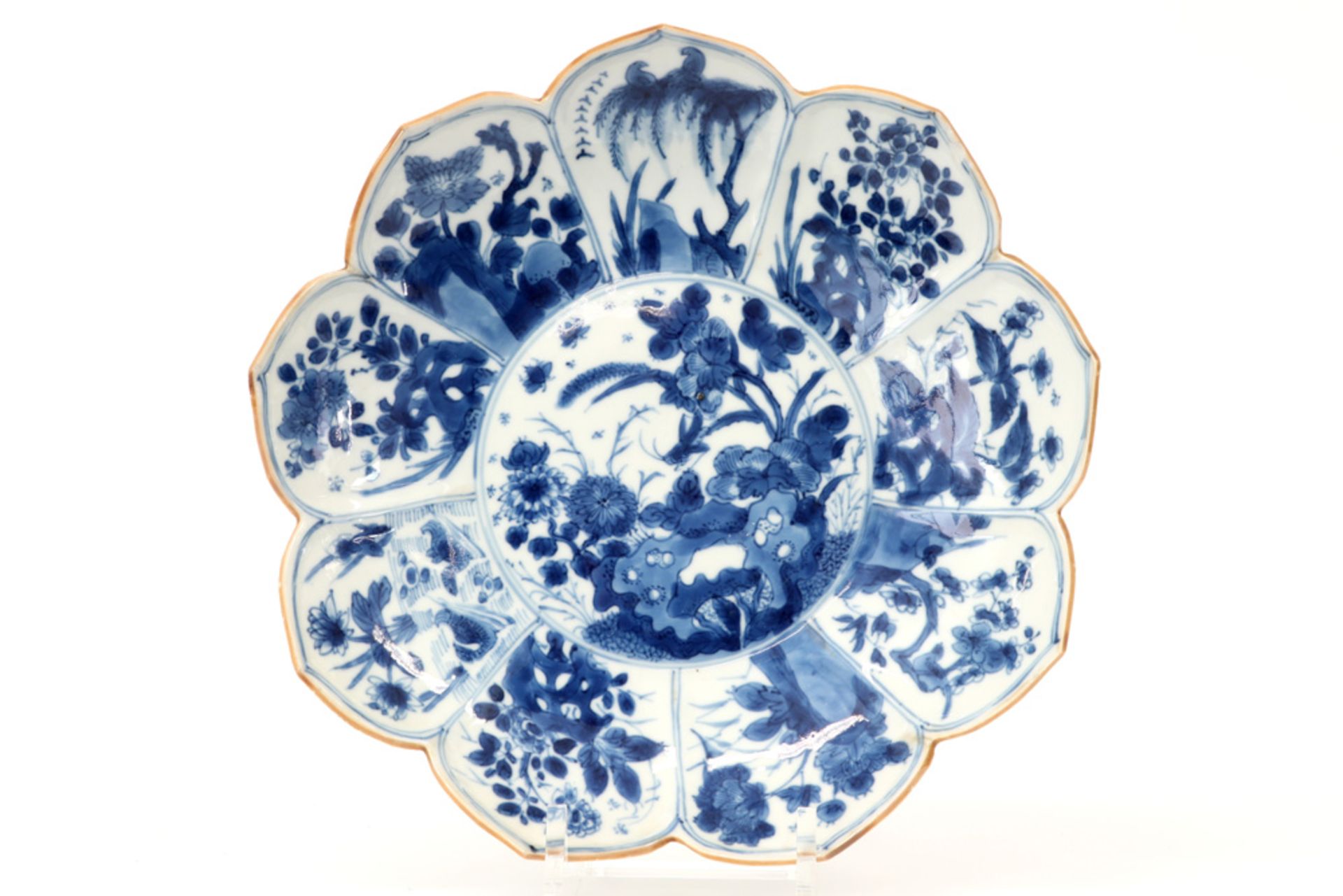 17th/18th Cent. lotusflower-shaped Chinese Kang Hsi period dish in porcelain with a blue-white decor