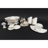 lot with old porcelain amongst which a pair of menu stands, an oval basket, etc ||Lot oud