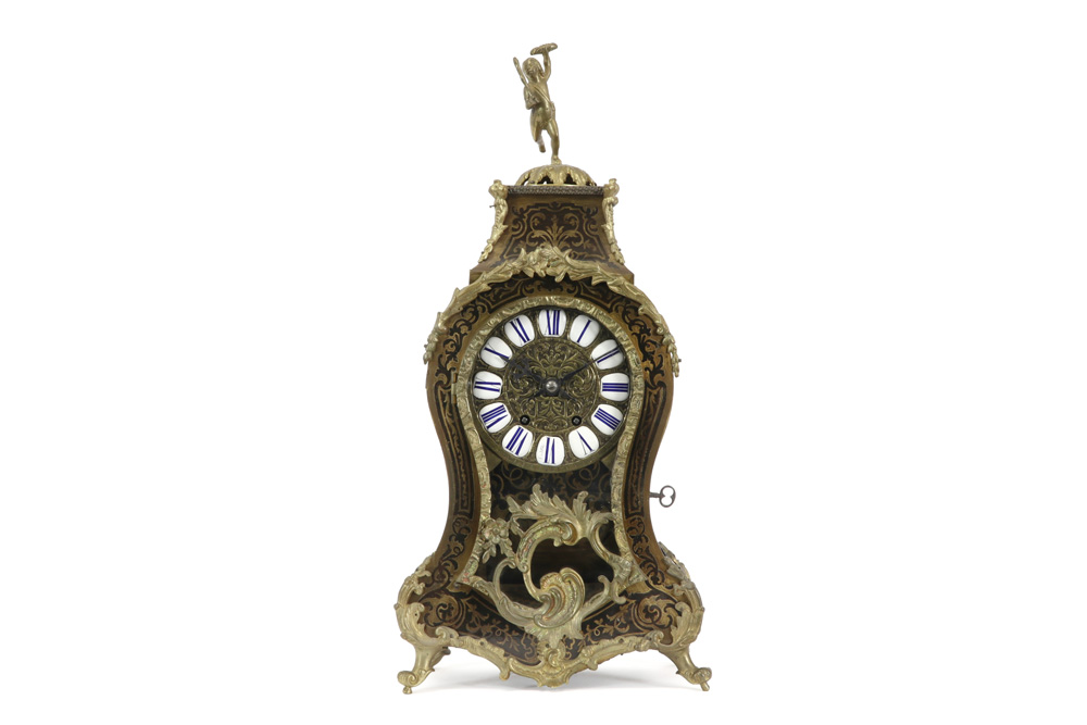 19th Cent. French Louis XV style clock with case in "Boulle" with gilded bronze mountings and a