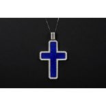 quite big cross-shaped pendant in white gold (18 carat) with blue enamel and at least 2 carat of