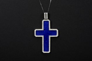 quite big cross-shaped pendant in white gold (18 carat) with blue enamel and at least 2 carat of