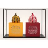 two Yayoi Kusama "Pumpkin" sculptures in red and yellow lacquered resin - with their original