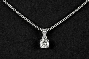 pendant in white gold (18 carat) with a ca 0,30 carat quality brilliant cut diamond on a chain in