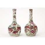 pair of 19th Cent. Chinese vases in porcelain with a blue-white and Cantonese decor with temple