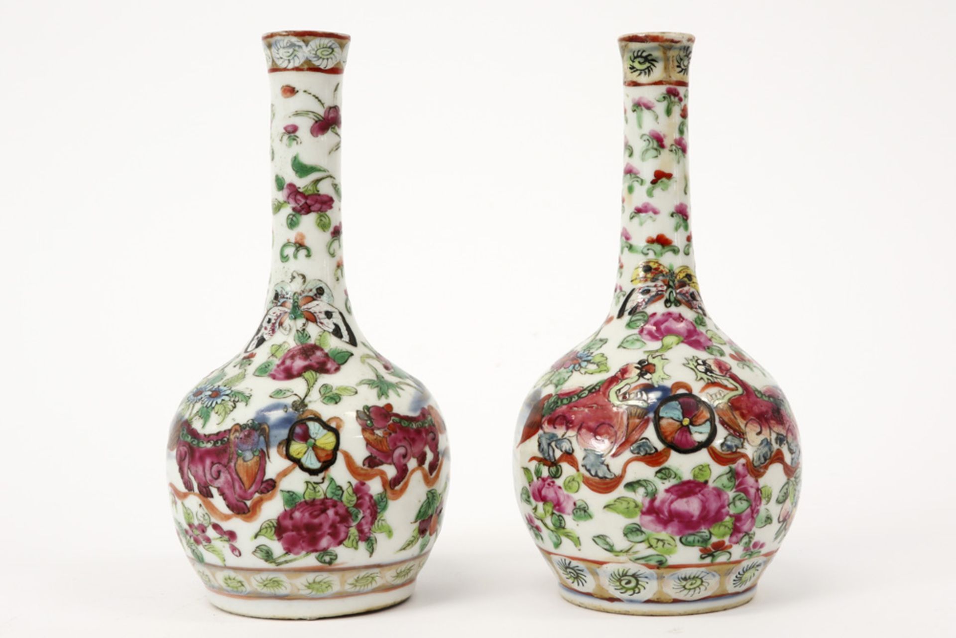 pair of 19th Cent. Chinese vases in porcelain with a blue-white and Cantonese decor with temple