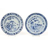 pair of 18th Cent. Chinese plates in porcelain with a blue-white decor with garden ||Paar achttiende