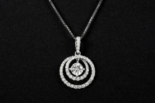 a ca 0,55 carat brilliant cut diamond set in a pendant in white gold (18 carat) with ca 0,60 carat