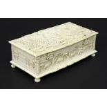 19th Cent. Dutch-colonial box from Batavia in ivory with finely sculpted bas relief panels - with