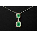 nice vintage pendant in yellow and white gold (18 carat) with two Columbian emeralds and ca 0,40