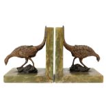 pair of Art Deco book-ends in onyx each with a gilded metal sculpture - signed Antoon Amorgasti ||