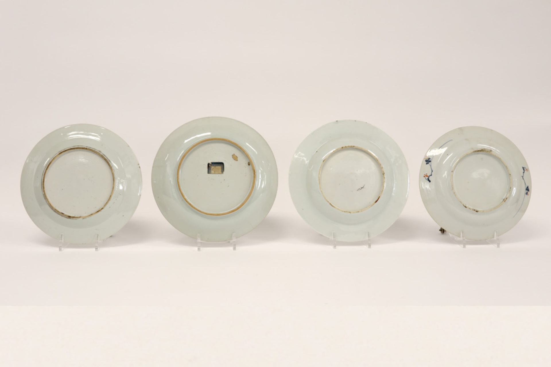 four 18th Cent. Chinese plates in porcelain, three with an Imari and one with a 'Famille Rose' decor - Image 2 of 2