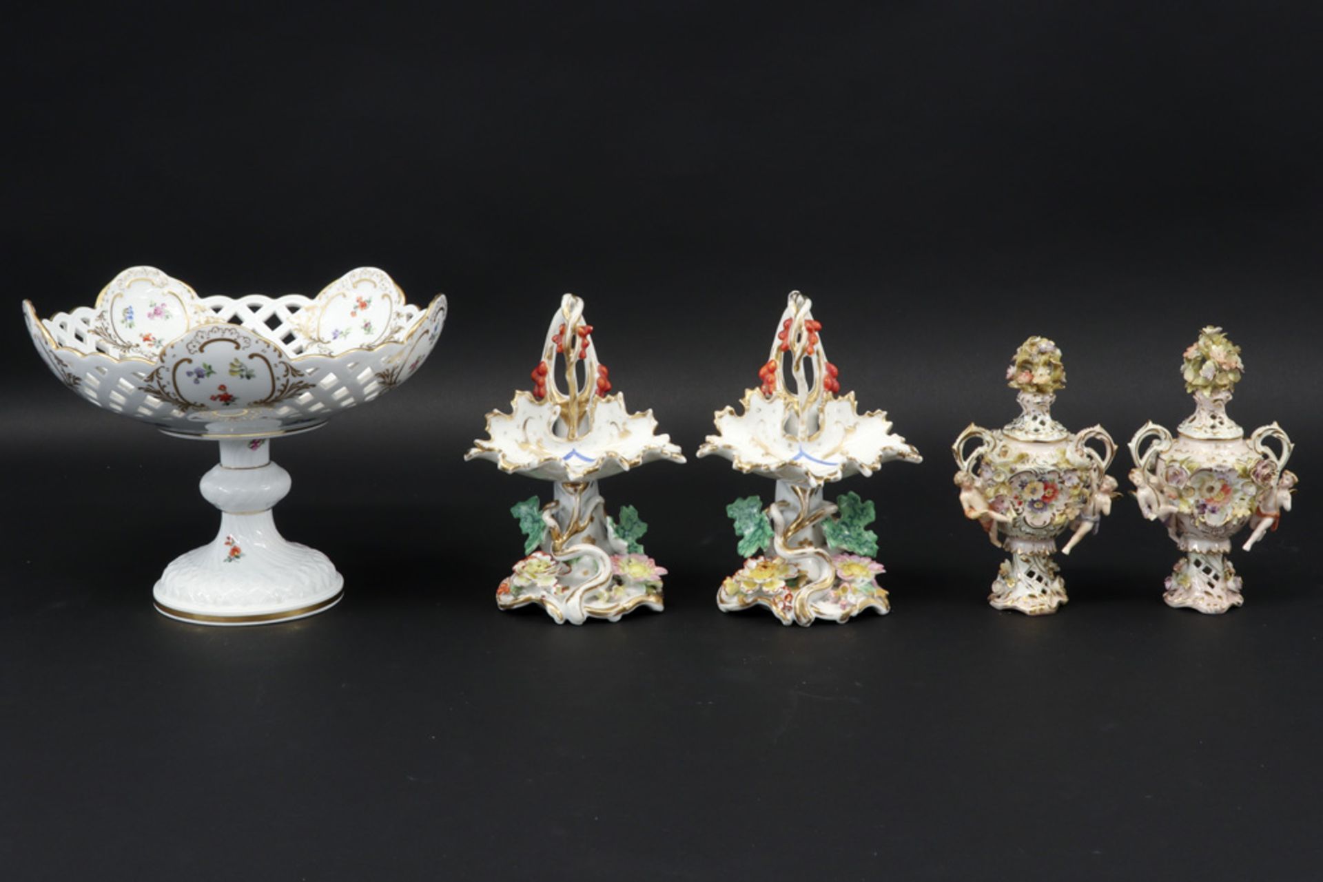 lot with old and antique porcelain amongst which a pair of 19th Cent. salt cellars, a Meissen marked