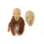 two masks from Sri Lanka in light wood prov : collection Prigogine - Brussels Mr. Yves Prigogine (