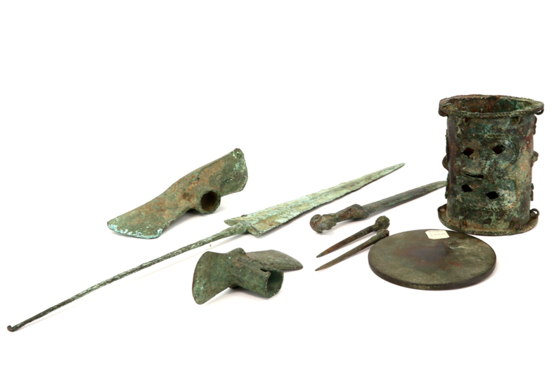 eight archaeological finds in bronze with typical irisation amongst which an axe, a spear and hair - Image 2 of 3