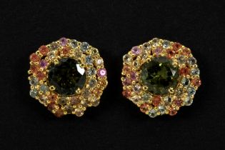 beautiful pair of earrings with a flower shape in yellow gold (18 carat) with more than 2 carat of