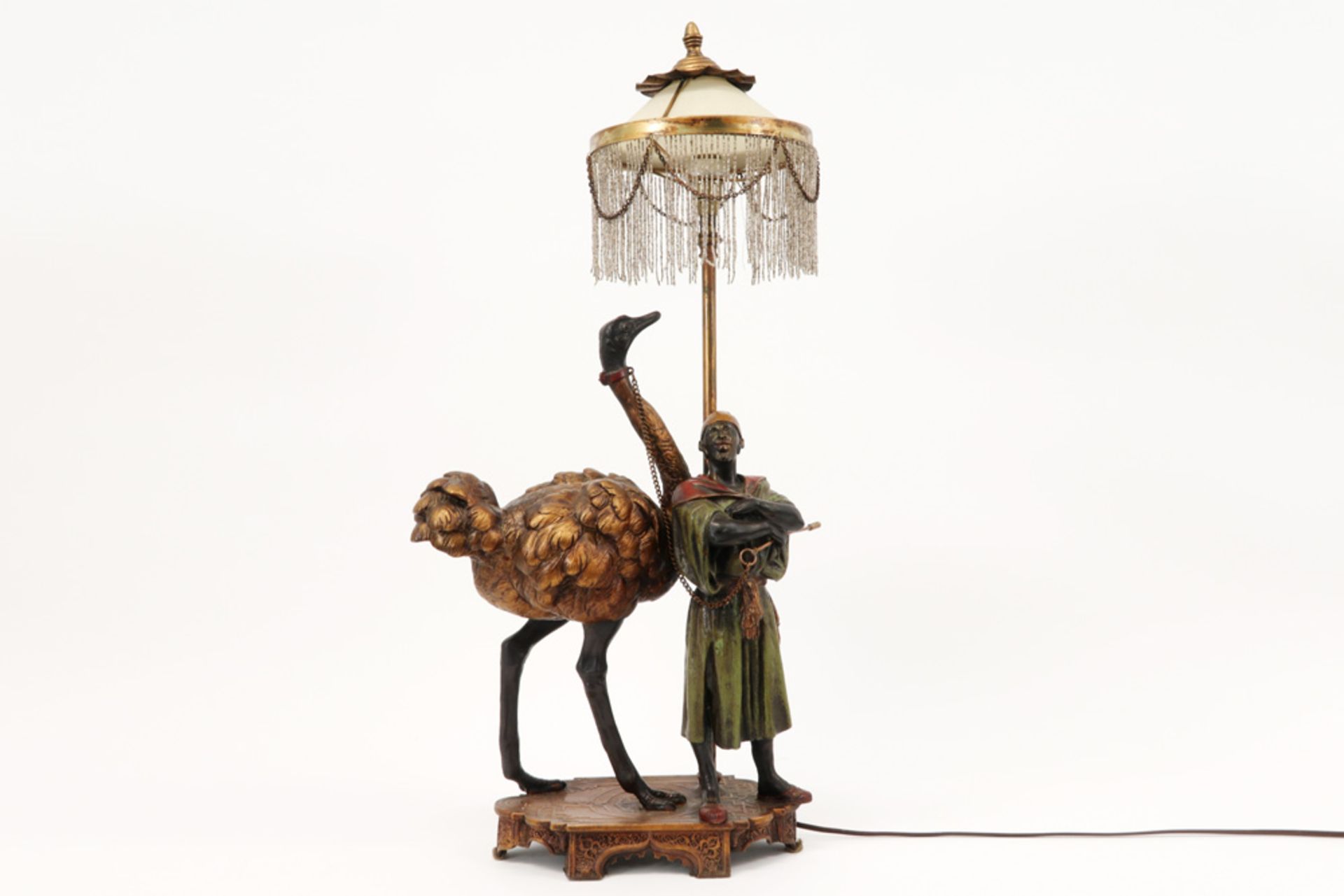 antique Vienna sculpture in polychromed metal with an orientalist style theme with an ostrich and