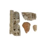 four antique archaeological Gandhara style findings, three in stone and one in earthenware ||Lot van