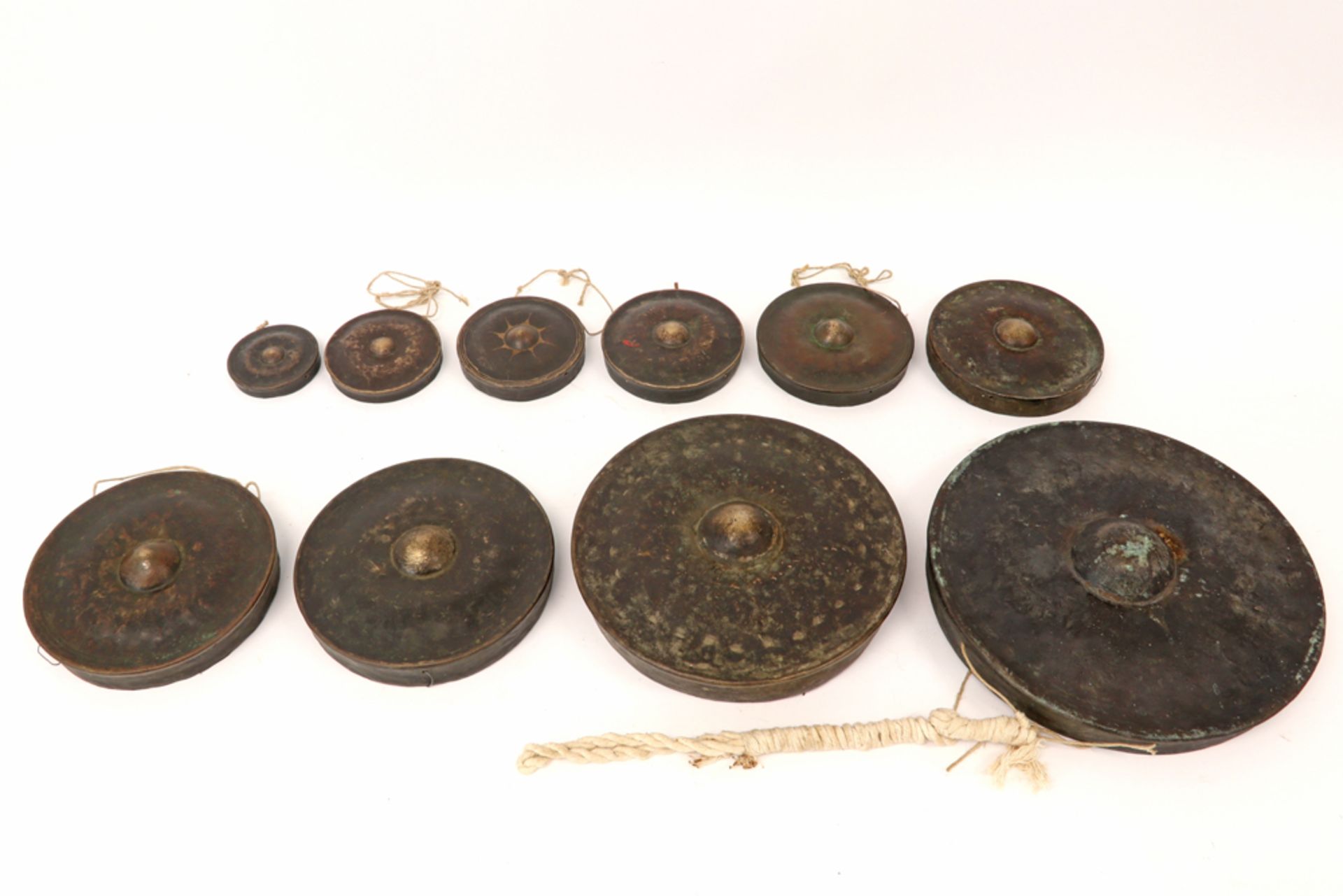 set of ten Northern Indian Naga gongs, used during ceremonial dances, festivals and initiation rites