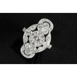 ring with with a nice Art Deco design in white gold (18 carat) with ca 1,30 carat of high quality