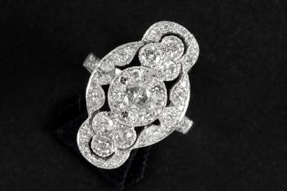 ring with with a nice Art Deco design in white gold (18 carat) with ca 1,30 carat of high quality