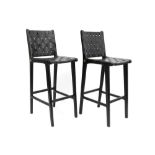 pair of Olivier De Schrijver signed "Kivu" design bar stools in black leather and ebonised mahogany,