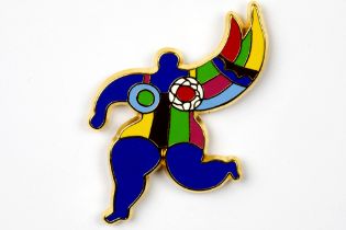 rare Niki de Saint Phalle brooch in vermeil and enamel with the typical "Nana" - signed on the
