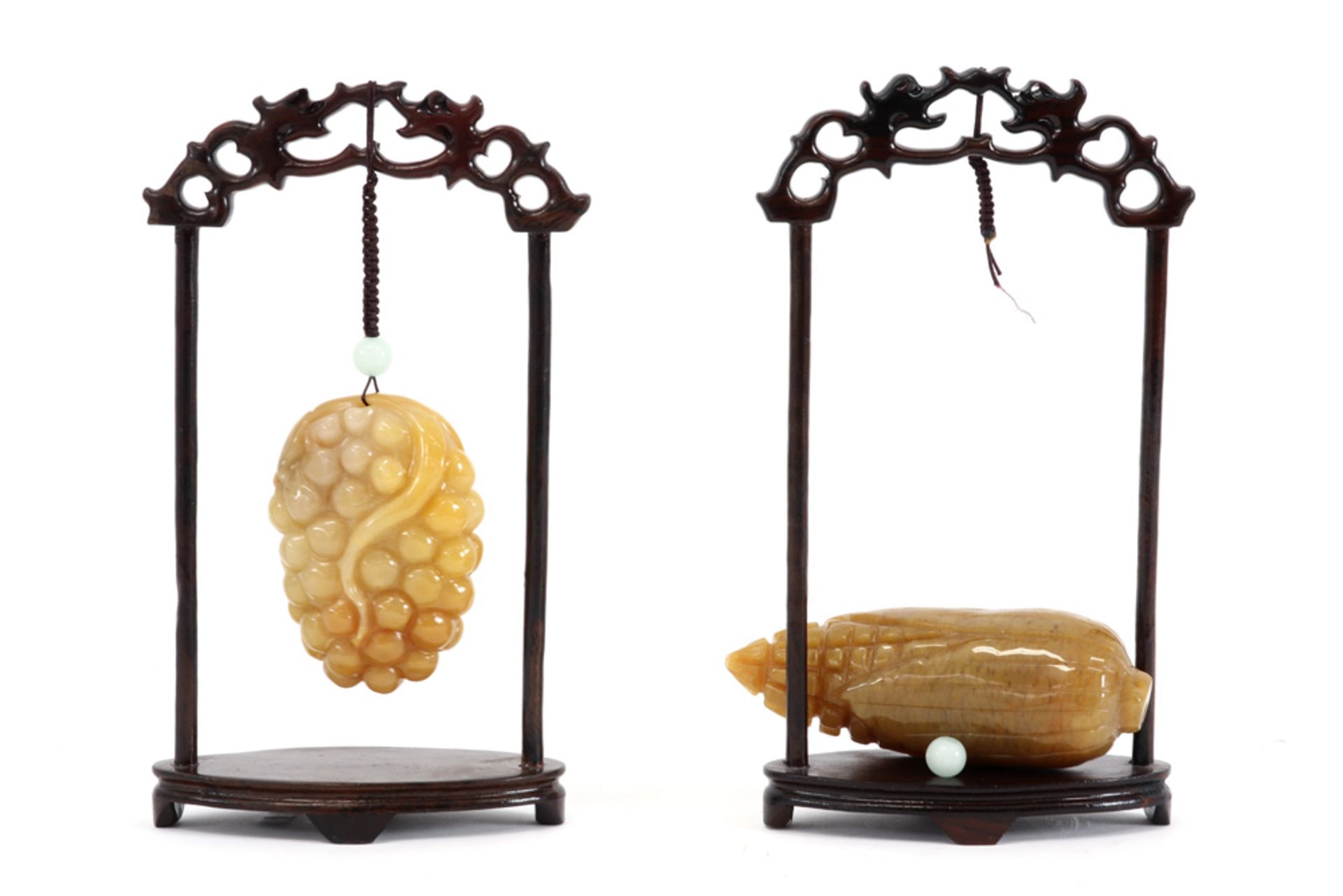 two Chinese pendatives in the shape of a fruit in a yellow type of stone - each with standard ||Twee - Image 2 of 2