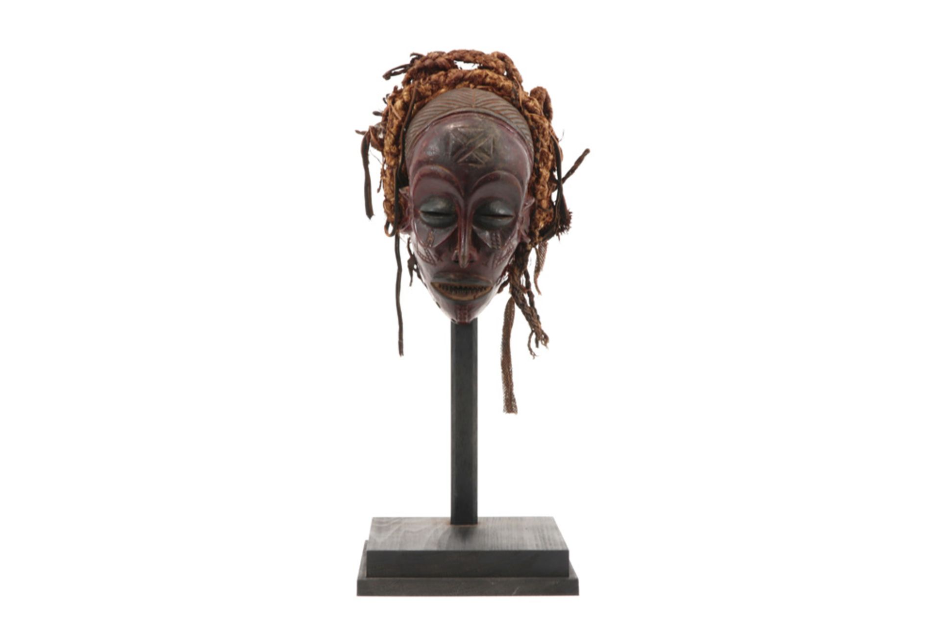 African Angola Chokwe mask in wood with typical reddish patina from an earlier collection of