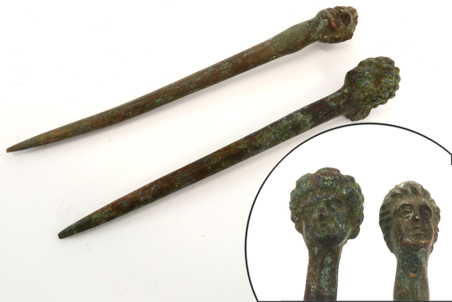 eight archaeological finds in bronze with typical irisation amongst which an axe, a spear and hair - Image 3 of 3