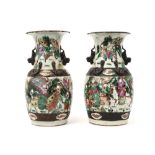 pair of antique Chinese "Nankin" vases in marked porcelain with a typical polychrome warriors' decor