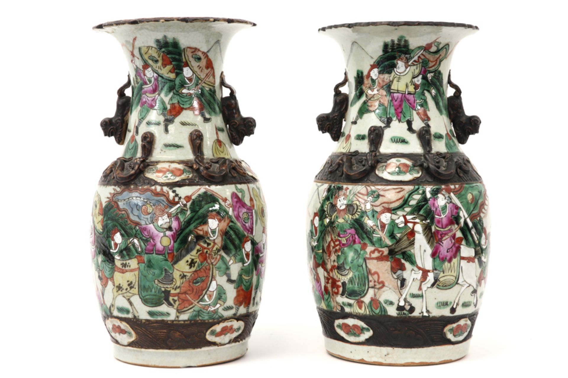 pair of antique Chinese "Nankin" vases in marked porcelain with a typical polychrome warriors' decor