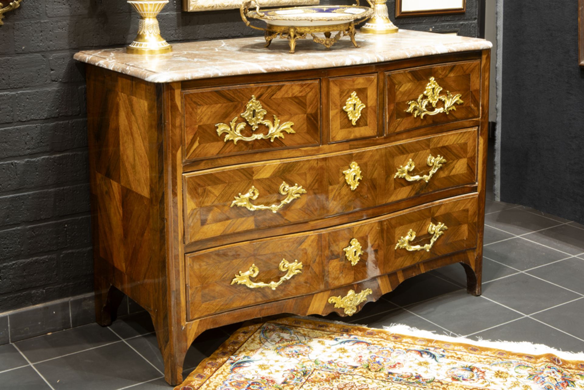 18th Cent. French Louis XV period chest of drawers in polished rose-wood with rich mountings in