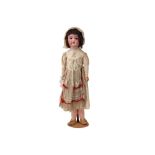 large Armand Marseille marked doll with porcelain head and original clothes and wig from around