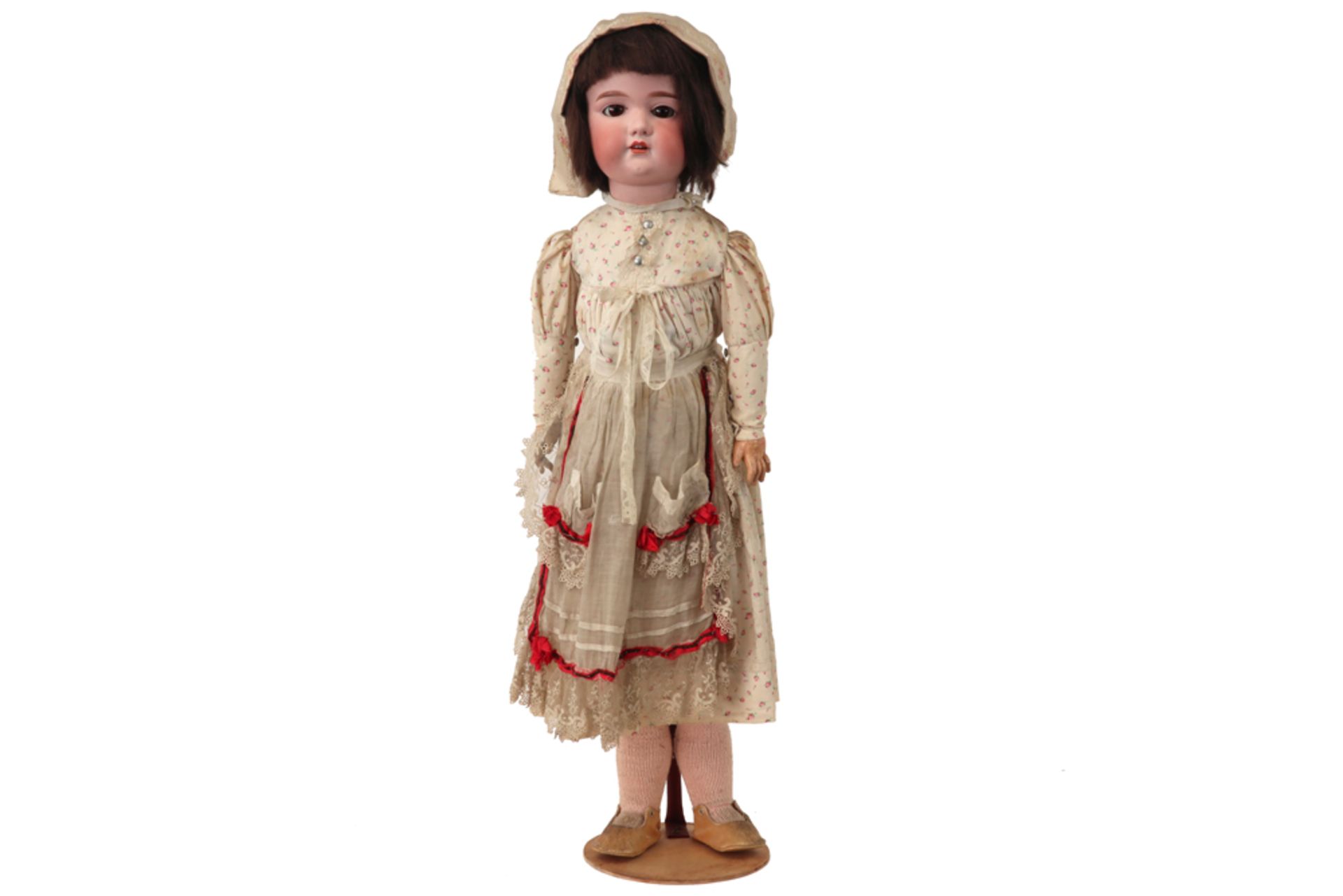 large Armand Marseille marked doll with porcelain head and original clothes and wig from around