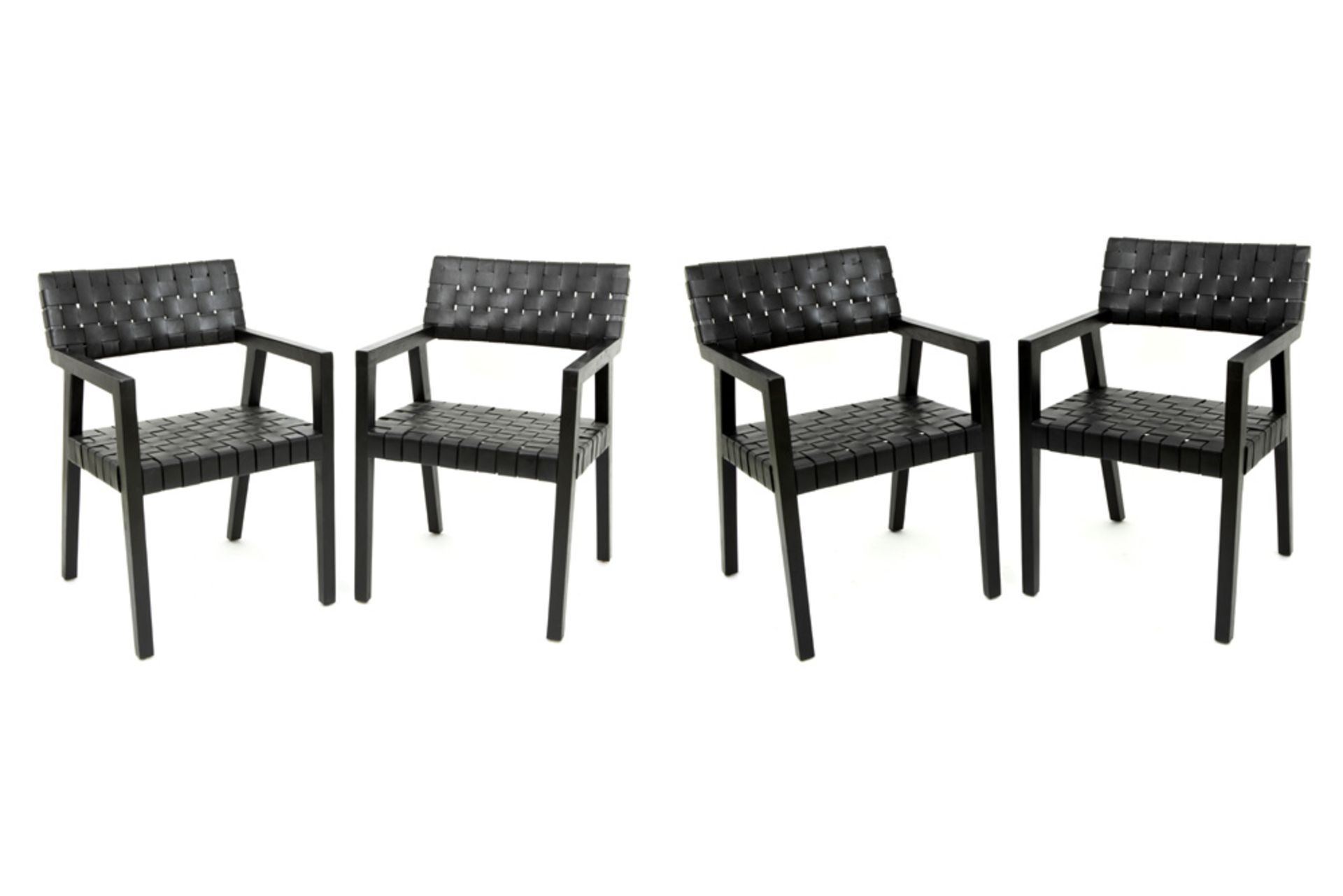 set of four Olivier De Schrijver signed "Boss" design armchairs made by Ode's Design in ebonised