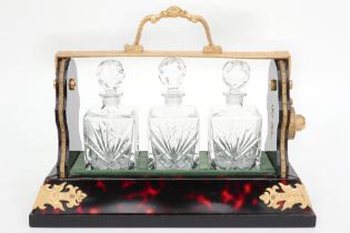 antique, presumably French, perfume cellar with gilded bronze and with three flasks in crystal ||