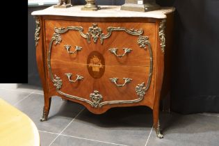 twenties' Louis XV style chest of drawers in mahogany with marquetry and bronze mountings and with a