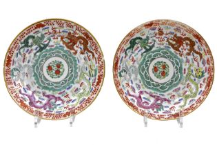 pair of Chinese plates in marked porcelain with a quite special polychrome decor with dragons ||