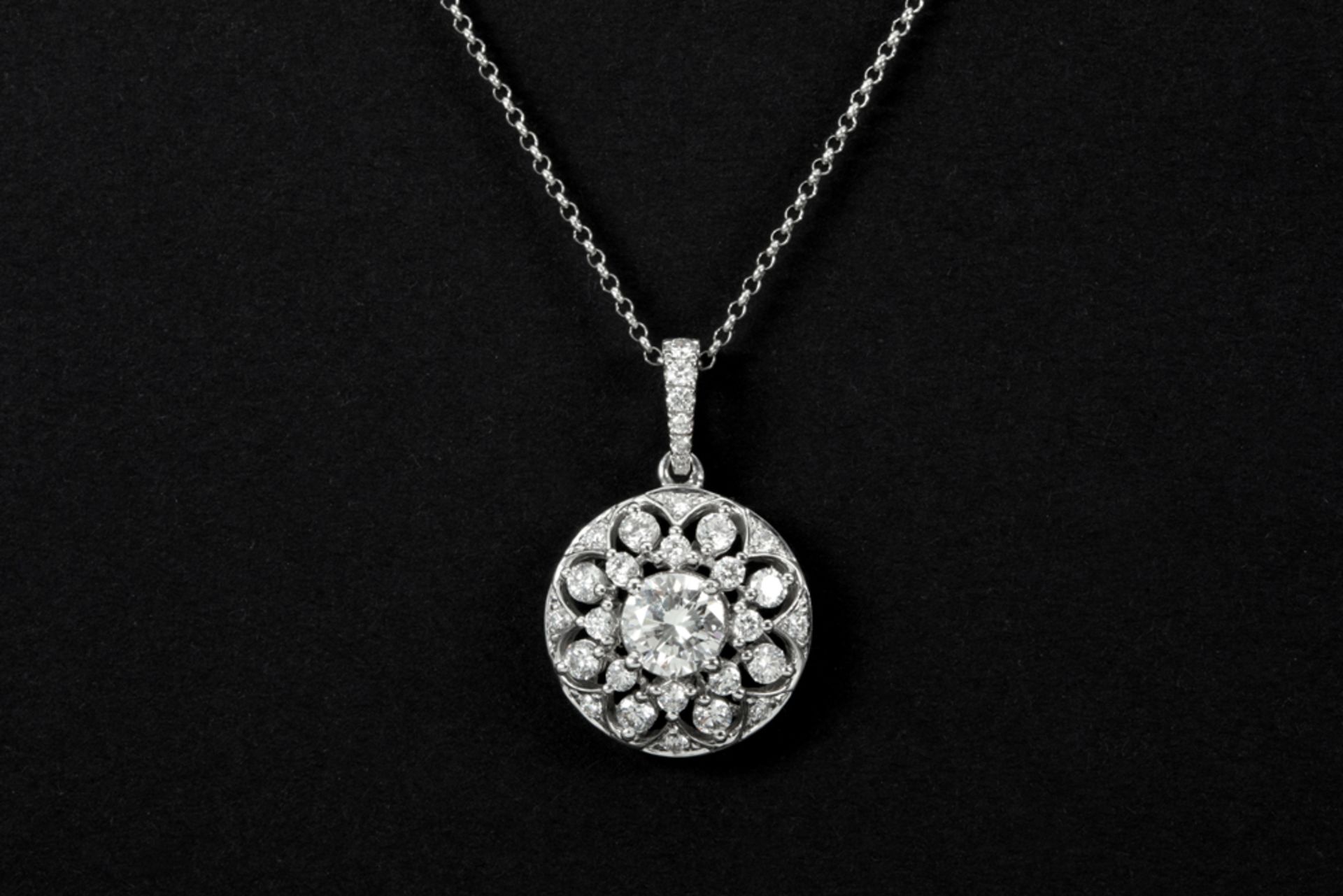 pendant in white gold (18 carat) with a central 0,70 carat high quality brilliant cut diamond,