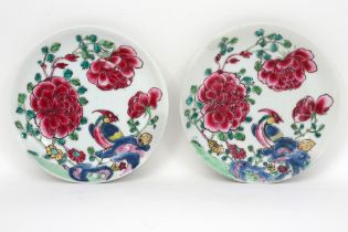 pair of small 18th Cent. Chinese plates in porcelain with a 'Famille Rose' decor with flowers and