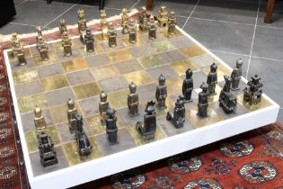 unique late 20th Cent. Belgian chessgame with pieces in glazed ceramic and with its matching table