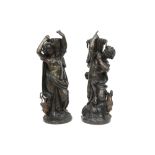 pair of antique bronze sculptures each with a Bacchanal scene with a figure, wine barrel and