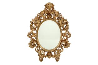 nice baroque style frame in sculpted and gilded wood with an old mirror || Zeer mooie,