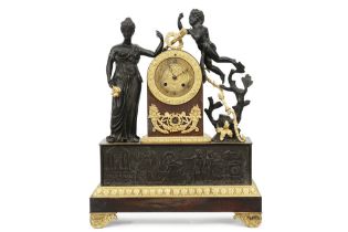 early 19th Cent. Empire style clock with its case in partially gilded bronze and with its work