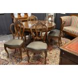 19th Cent. set of chairs and a neoclassical table with oval extendable top in mahogany ||