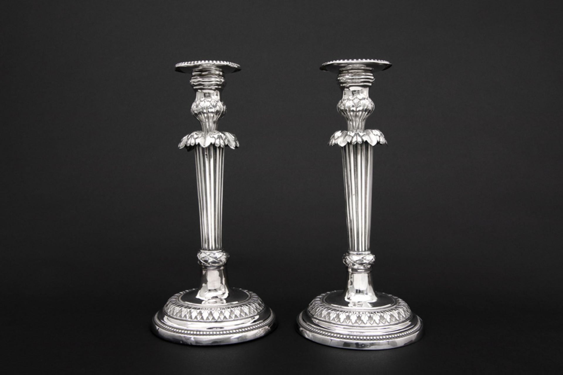 pair of antique, probably English, neoclassical candlesticks in silver with illegibly marks ||