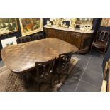 vintage dining-room suite in oak- with sculpted Régence ornamentation : a extendable table, ten