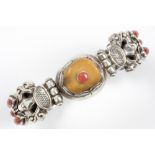 old ethnic bracelet in (afterwards) marked silver with corals and a nice amber stone || Oude etnisch